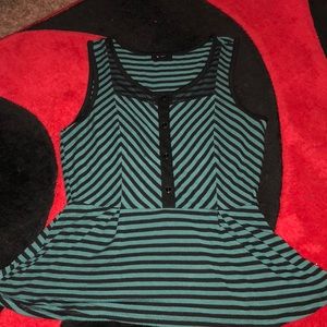 A blue/ teal and black blouse